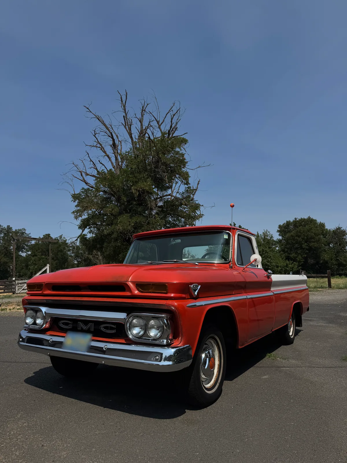 Finished red and white classic GMC pickup