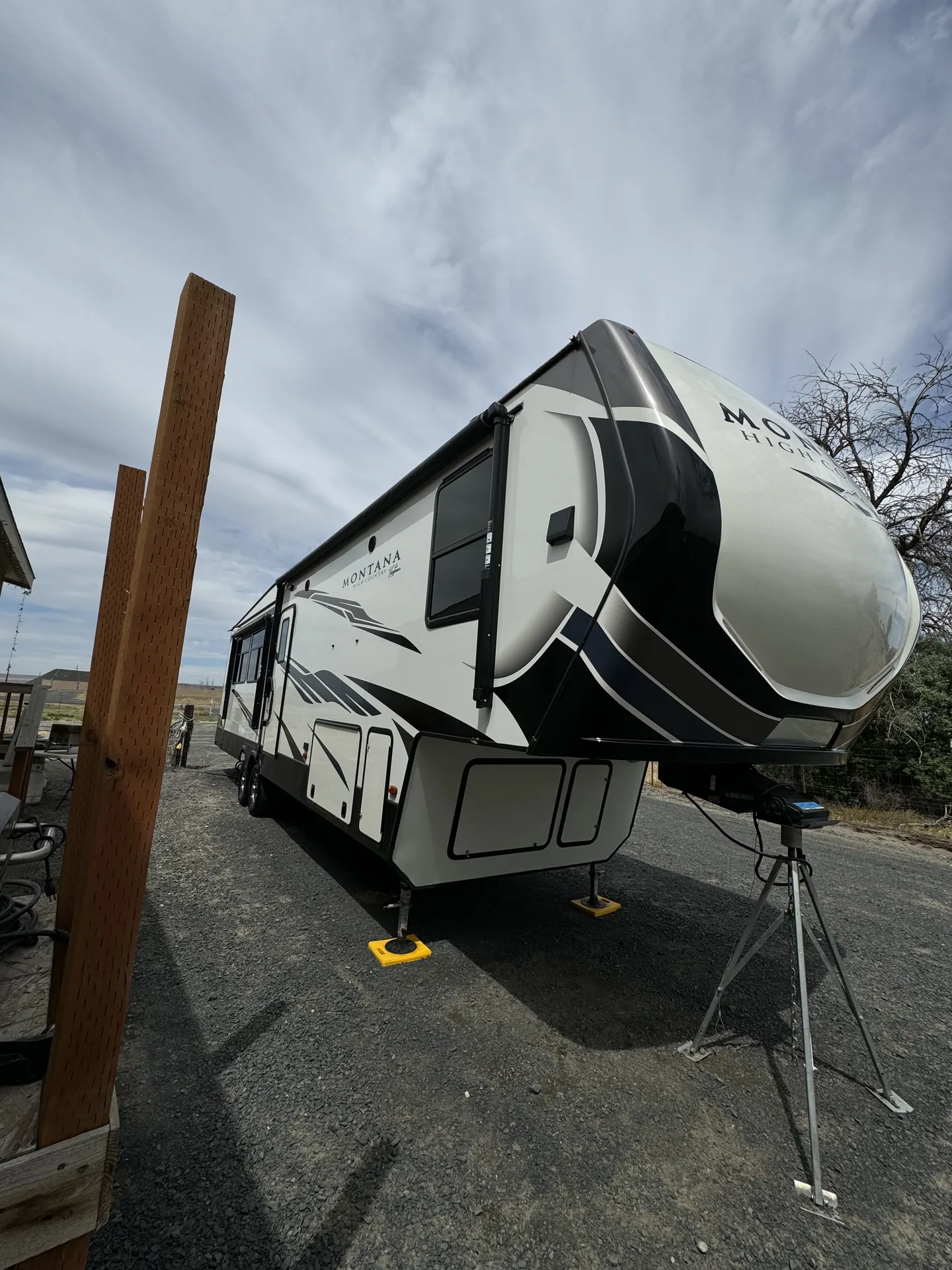 Clean fifth-wheel RV exterior photographed after detailing